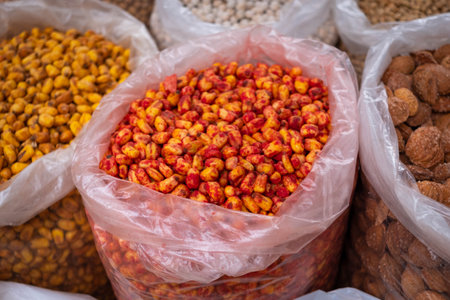 Corn seeds and nuts for sale on food marketの写真素材