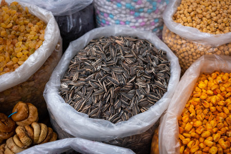 Sunflower seeds and nuts for sale on snack food marketの写真素材