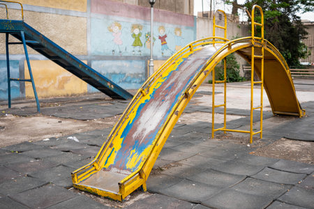 run down slide on old playground, Damascus, Syria ,の写真素材