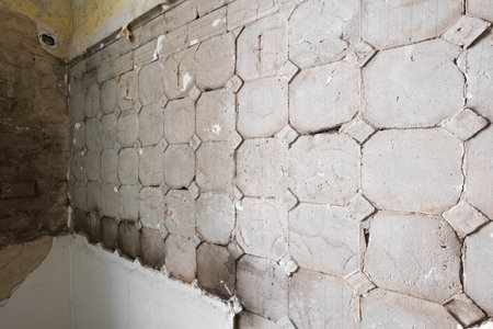 old kitchen wall after removing historic tiles, tile renovation -の写真素材