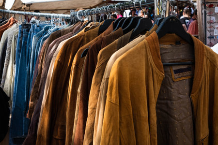 second hand leather jackets on vintage clothing flea marketの写真素材