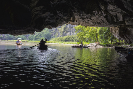 Inside view out of natural cave in Tam Coc scenic spot, Ninh Binh, Vietnamの写真素材