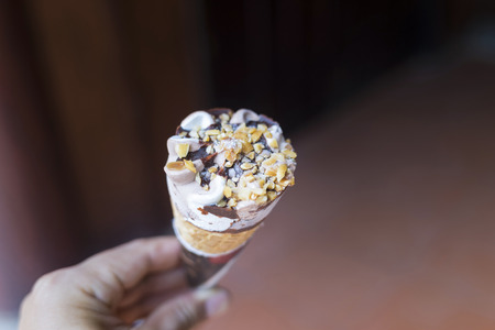 Ice cream hold in hand