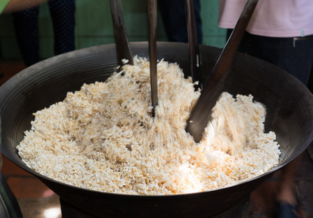 Process of making Marshmallow Crispy puffed Rice cake in Mekong delta, southern Vietnam, motion blurの写真素材