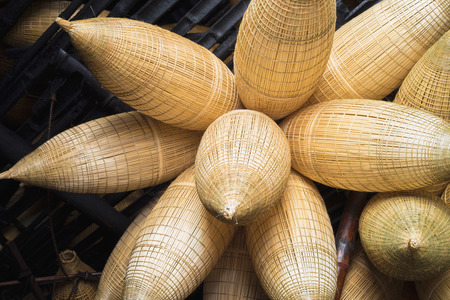 Vietnamese old traditional bamboo fish trapの写真素材