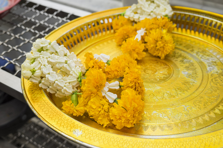 Flower garlands in Thai style. Buddhism offeringsの写真素材