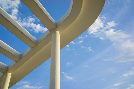 Details of building roof with cement lines against blue skyの写真素材