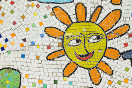 Porcelain pieces mosaic background. Sun face shapeの写真素材