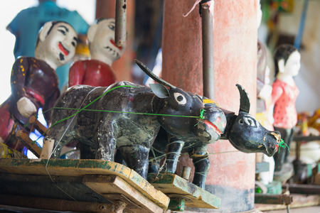 Common Vietnamese water puppets behind puppetry state. The control room is dark to hide puppeteers and instrumentsの写真素材