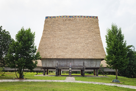 Typical house of J'rai people in central high land of Vietnam ( Rong house in Vietnamese)の写真素材