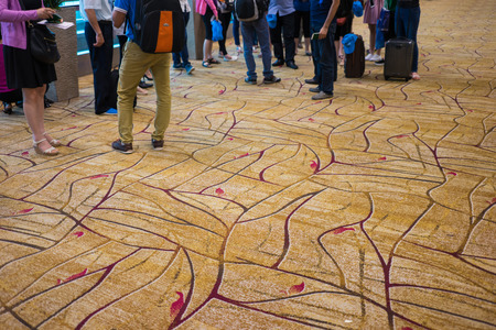 Carpet with passenger on background in airportの写真素材