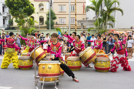 Hanoi, Vietnam - Sept 8, 2014: A show of dragon and lion dance performed at lunar mid autumn festival at Times City Complex. This is a form of traditional dance and performance in Vietnamese cultureのeditorial素材