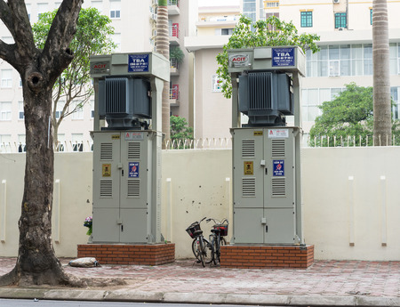 Hanoi, Vietnam - Nov 16, 2014: Electric cabinets on sidewalk of Tran Hung Dao street. Many electric boxes staying on sidewalk are dangerous, especially in raining seasonのeditorial素材