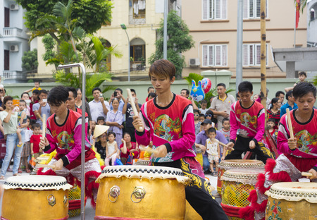 Hanoi, Vietnam - Sept 8, 2014: A show of dragon and lion dance performed at lunar mid autumn festival at Times City Complex. This is a form of traditional dance and performance in Vietnamese cultureのeditorial素材