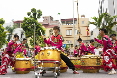 Hanoi, Vietnam - Sept 8, 2014: A show of dragon and lion dance performed at lunar mid autumn festival at Times City Complex. This is a form of traditional dance and performance in Vietnamese cultureのeditorial素材