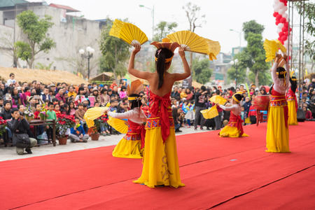 Hanoi, Vietnam - Feb 7, 2015: School pupils perform a dance on stage at Vietnamese lunar new year festival organized at Vinschool, Vinhomes Times City, Minh Khaiのeditorial素材