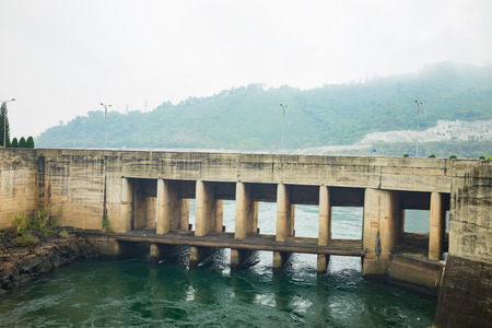 Hoa Binh, Vietnam - Jan 14, 2016: Outlet discharge gate in Hoa Binh Hydroelectricity Plant. The plant was built from 1979 to 1994 with 8 machines provides 1920 MW, equal to one third of productivity of Vietnam.のeditorial素材