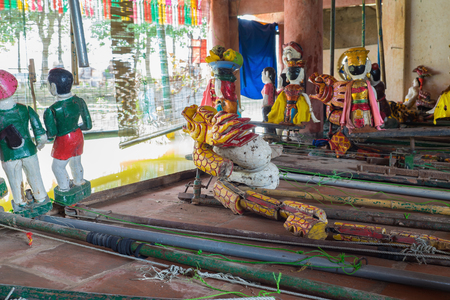 Hanoi, Vietnam - Sep 20, 2015: Common Vietnamese water puppets behind puppetry state in Dao Thuc village. The control room is dark to hide puppeteers and instrumentsのeditorial素材