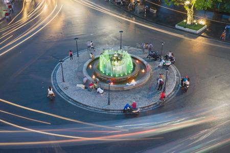 Hanoi, Vietnam - Aug 28, 2015: Aerial view of traffic roundabout locating next to Hoan Kiem lake, center of Hanoi.のeditorial素材