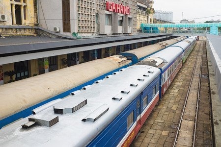 Hanoi, Vietnam - Aug 30, 2015: Railway passenger cars at Hanoi station. Vietnam Railways is the...