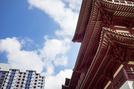Singapore - May 2, 2016: Roof of Buddha Tooth Relic Temple and Museum against blue sky in Singaporeのeditorial素材