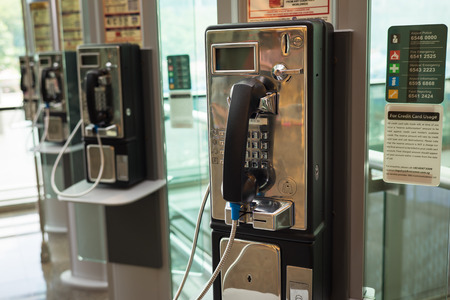 Singapore - May 2, 2016: Public telephone at Changi airport, Singaporeのeditorial素材