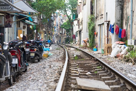 Hanoi, Vietnam - Aug 7, 2016: Railway crossing the middle of Hanoi city with crowded housesのeditorial素材