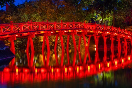 The Huc bridge (red bridge), entrance of Ngoc Son temple on Hoan Kiem lake, Hanoi, Vietnamの写真素材
