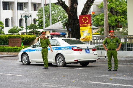 Hanoi, Vietnam - Sep 2, 2016: Vietamese police sedan with red/blue lights in an event on Dinh Tien...