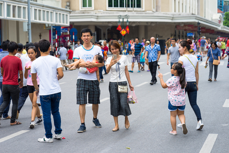 Hanoi, Vietnam - Sep 2, 2016: People walking on Dinh Tien Hoang, the walking street by Hoan Kiem lake, center of Hanoiのeditorial素材