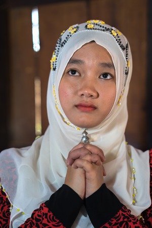 An Giang, Vietnam - Sep 6, 2016: Portrait of Vietnamese muslim girl in a champa village, Khanh Hoan district, South Vietnamのeditorial素材