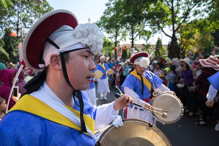 Dak Lak, Vietnam - Mar 10, 2017: Performers wear traditional costumes performing a traditional dance at an event organised in Buon Me Thuot cityのeditorial素材