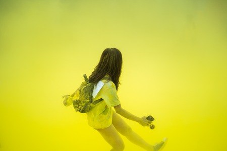 People dancing at an color run eventの写真素材