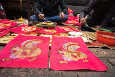 Hanoi, Vietnam - Jun 22, 2017: Dong Ho paintings. Dong Ho folk woodcut ancient painting, an aesthetic symbol in Vietnam culture in So village, Quoc Oai district.のeditorial素材