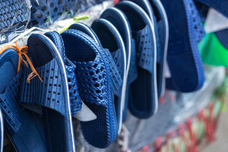 Cheap sandals for sale on Hanoi street, Vietnamの写真素材