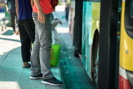 People entering bus closeupの写真素材