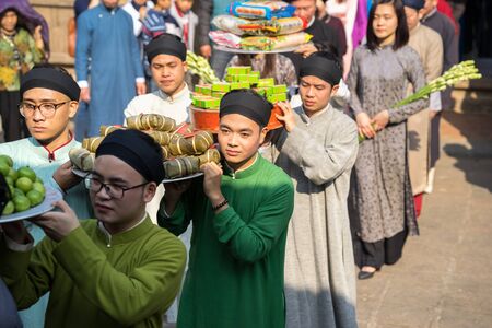 Hanoi, Vietnam - Jun 22, 2017: Traditional incense offering ritual during lunar new year Tet holiday in communal house at So village, Quoc Oai district.のeditorial素材