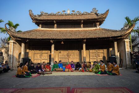 Hanoi, Vietnam - Jun 22, 2017: Courtyard of communal house with a stage of folk music and dance at So village, Quoc Oai district,のeditorial素材