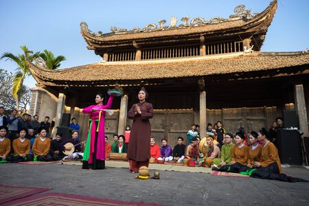 Hanoi, Vietnam - Jun 22, 2017: Courtyard of communal house with a stage of folk music and dance at So village, Quoc Oai district,のeditorial素材
