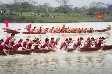 Bac Ninh, Vietnam - Feb 7, 2017: Traditional boat racing spring festival on Cau river, Bac Ninh provinceのeditorial素材