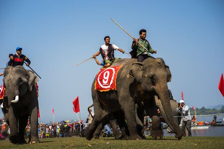 Dak Lak , Vietnam - March 12, 2017 : Elephant racing festival by Lak lake in Dak Lak, center highland of Vietnamのeditorial素材