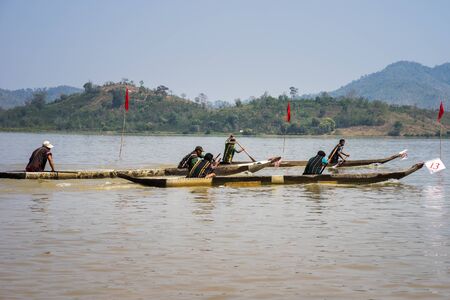 Dak Lak , Vietnam - March 12, 2017 : Traditional dug-out canoe racing festival on the Lak lake in Dak Lak, center highland of Vietnamのeditorial素材