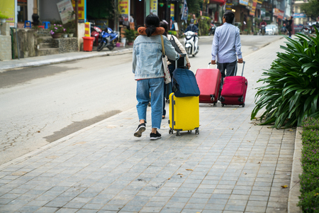 Tourists in Sapa tourism town, Lao Cai, northern Vietnamの写真素材