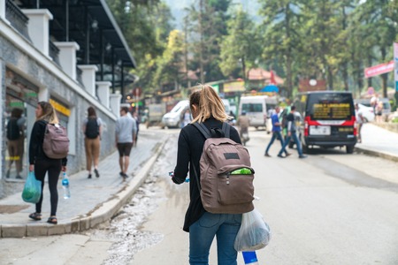 Tourists in Sapa tourism town, Lao Cai, northern Vietnamの写真素材