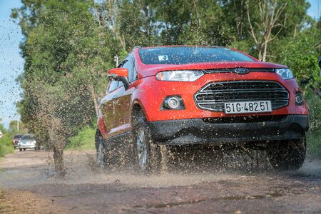 Chau Doc, Vietnam - Oct 13, 2018: All new Ford Everest 2018 car on the rural road in test drive, Vietnam.のeditorial素材