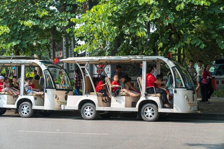 Hanoi, Vietnam - Oct 9, 2018: Sightseeing electric cars in Ôn Dinh Tien Hoang street, Hanoi cityのeditorial素材