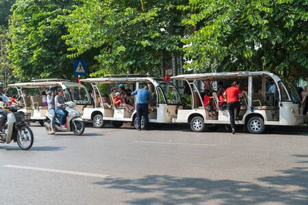 Hanoi, Vietnam - Oct 9, 2018: Sightseeing electric cars in Ôn Dinh Tien Hoang street, Hanoi cityのeditorial素材
