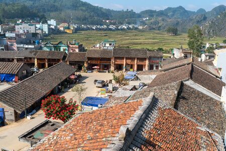 Ha Giang, Vietnam - Nov 26, 2018: Dong Van old flea market with old aged tiled roof housesのeditorial素材