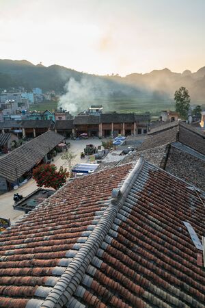 Ha Giang, Vietnam - Nov 26, 2018: Dong Van old flea market with old aged tiled roof housesのeditorial素材