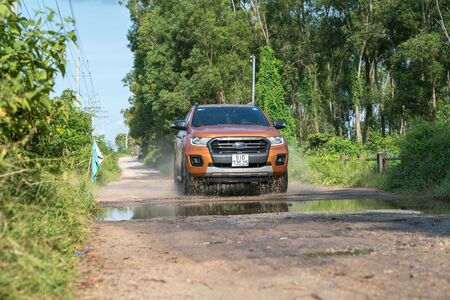 Chau Doc, Vietnam - Oct 13, 2018: All new Ford Everest 2018 car on the rural road in test drive, Vietnam.のeditorial素材